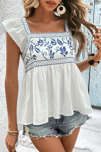 White with Blue Embroidered Bust Ruffled Sleeveless Tied Back Peplum Top